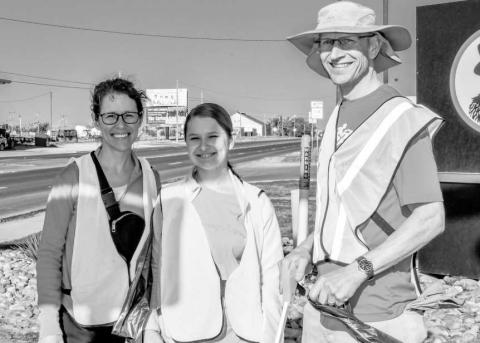 SPRING INTO ACTION - The Neiderhauser family smiled big as they volunteered their time to help clean up along Highway 114 in Levelland during Keep Levelland Beautiful’s (KLB) Spring Cleanup this past Saturday. (Staff photo by Hannah Woodrum)