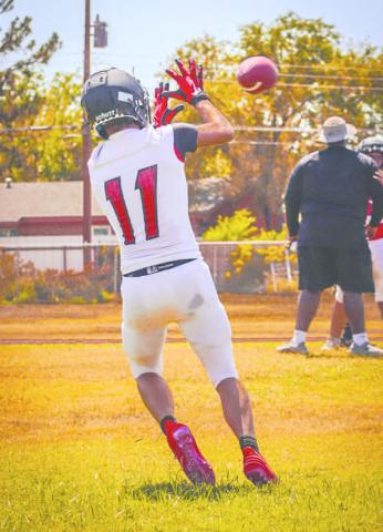 QUICK CATCH - Levelland Lobo Gage Potter caught the ball off of a wide receiver screen during team drills at two-a-days practice at the Levelland High School. (Staff photo by Aalijah Soliz)
