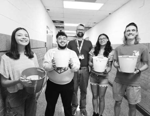 STUCO GIVES BACK - LHS Student Council members welcomed back new LHS teachers on campus with survival buckets. The survival buckets include pens, band-aids, sticky notes, aspirin and more items for the upcoming year. Pictured from left to right are: Melody Demel, Alvaro Loza, Student Council Sponsor Scott Lawson, Amor Gabaldon and Ryan Jeanneret. (Photo courtesy of LHS)