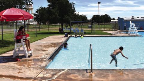 - Pictured is lifeguard Makaylyn Dominguez watching out for local children at the Levelland City Pool. Many high school students work at the pool, and it is a good way to beat the heat while having fun. (Staff photo by Ada Niederhauser)