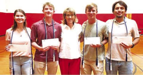 (YELL) SCHOLARSHIPS-- Young Emerging Leaders of Levelland (YELL) students received $1,000 scholarships recently. Shown with Levelland Chamber of Commerce Mary Siders are Ada Niederhauser, W. Michael Canon, Nathan Ellis and Brady Houston who have been active with the organization in making a difference for others in Levelland. (Levelland ISD photo)