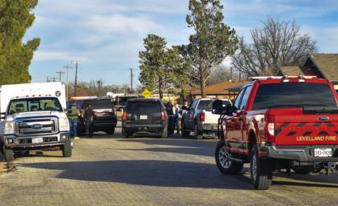 POLICE STAND OFF - The Levelland Police Department attempted to serve a warrant Tuesday afternoon that resulted in a stand off in the 500 block of 8th Street. LPD, Hockley County Sheriff’s Office, Levelland EMS, Levelland Fire Department and Levelland-Hockley County Emergency Management were on scene as the stand off began around 4 p.m. and ended before 6 p.m. Three individuals were arrested as result of the warrant service and stand off. (Staff photo by Dom Puente)