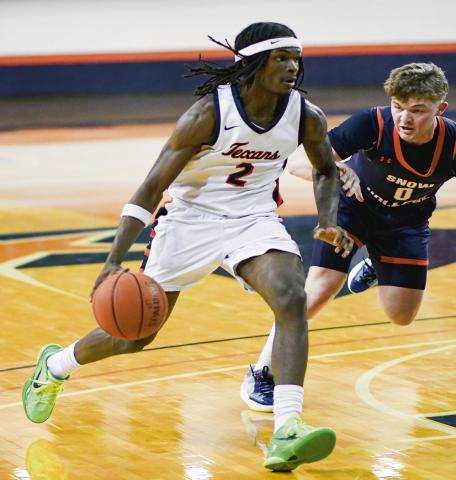 WARE ON THE DRIVE - South Plains College redshirt freshman guard Deion Ware drives to the basket during their game against Snow College this past Thursday night at the Texan Dome. (Staff photo by Jentezen Smith)