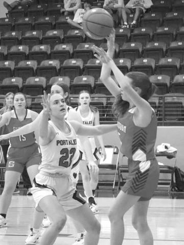 INBOUND - Sundown Roughette Camry Jourden passed the ball to her teammates during the teams first game of the Littlefield Tournament against the Portales Lady Rams where the team fell 66-33. (Staff photo by Aalijah Soliz)
