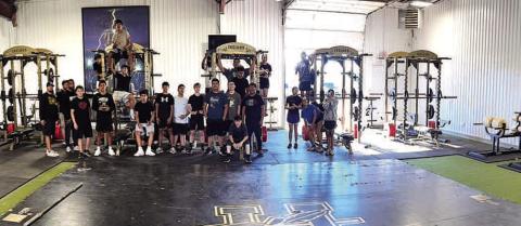 MORTON ISD WEIGHT ROOM – The Morton ISD school board and administration approved purchasing new glute/ ham machines, sleds, dumbbells and racks, medicine balls and hex bars for the school weight room. Students and coaching staff worked side by side to move everything out, clean and reorganize and mount a new TV. (Morton ISD photo)