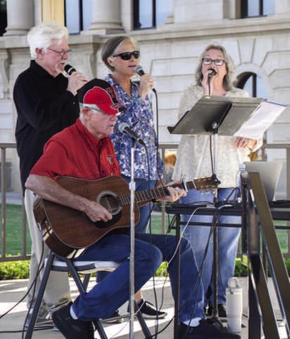 LIVE MUSIC AT THE LAWN – The showcase performance group First United Methodist Church Praise Team performed at the Hockley County Courthouse lawn at Saturday’s Falling for the Wallace. The quartet was one of multiple live music acts that played at the gazebo for the event, at the showcase. (Staff photo by Evin Thomas)