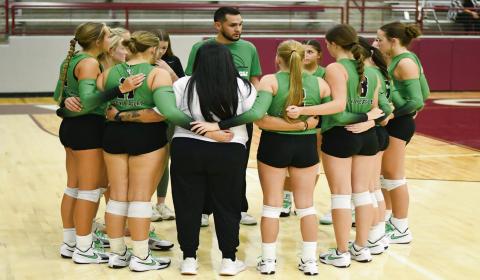 STACKING WINS - The Ropes Lady Eagles volleyball team and coaches huddle up during a match earlier this season. Following their most recent win against Tahoka, the Lady Eagles improved to 29-9 overall and 8-1 in district play this season. (Staff photo by Jentezen Smith)