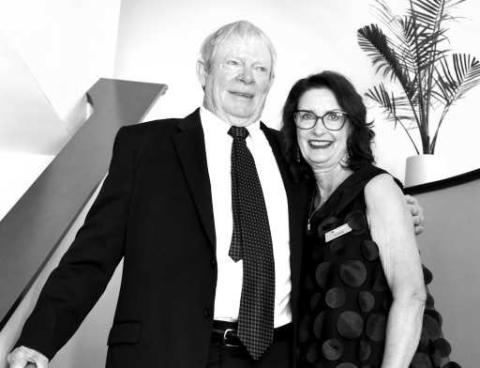 READY FOR GRAND OPENING-- David Whitsett from Arkansas and Iris Keeling on the elegant stairway at the Wallace Theater. (Staff photo by Lynda Work)