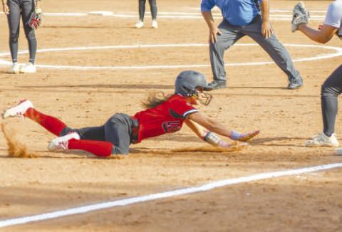 GOINGALL OUT - Levelland Loboette Saydi Mendoza took third base against the Snyder Lady Tigers at home, Tuesday. The Loboettes would get revenge against the Lady Tigers with a 6-5 win. The win puts both the Loboettes and the Lady Tigers at 6-1 in the district race for the top spot. The Loboettes hosted the Lakeview Maidens Friday at home.(Staff photo by Dom Puente)