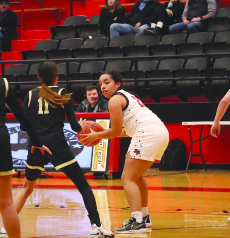 OFFENSE - Levelland Loboette Olivia Velardez got the ball in the post to run the offense through her so she could find the open teammate. (Staff photo by Aalijah Soliz)