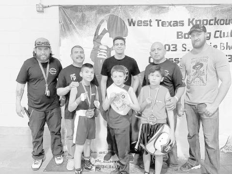 ODESSA SHOWCASE- On April 1st Shark Attack Boxing participated in the Odessa Boxing showcase. Cade Phelps won his match-up. Enrique Gonzales and Axel Gonzalez lost on decision. Pictured are: Coach Carlos Olivas, coach Ernest Gonzalez, coach Damian Nieland, coach John Espinoza, coach Trey Phelps, Enrique Olivas, Axel Gonzalez and Cade Phelps. (Photo Courtesy of Sharky Lecroy)