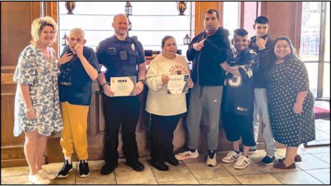 CONTINUED RECOGNITION - Levelland PD’s Officer Moody was recognized for his efforts, quick thinking and bravery in stopping a runaway can with brake failure in March. ResCare recognized Moody with a Hero Award during a reception last week. Additionally, the driver of the van was also recognized for her calm demeanor and ability to keep the clients calm during the traumatic incident. (Photo courtesy of the LPD)