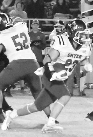 FIRSTDOWNRUN- Christian Charles had eight carries for 48 yards for the Smyer Bobcats in a 24-12 road win over the Morton Indians last Friday in UIL high school football action. Smyer will host Seagraves on Friday while Morton hosts New Home. Games start at 7 p.m. (Photo Courtesy of Jay Kelley)