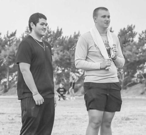 FOOTBALLCAMP - Ropes Eagles players Brent Buckner and Broxton Varnell helped out the coaches this past Monday during the Ropes Eagle Football Camp. (Staff photo by Aalijah Soliz)