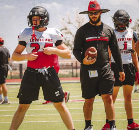 DRILLS - Levelland Coach Isaac Garza and Lobo Jackson Gibbs went over drills this past Thursday at Lobo Stadium during two-a-days practices. (Staff photo by Aalijah Soliz)