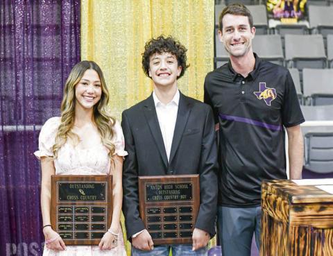 CROSS COUNTRY AWARDS - Outstanding Girl Athlete: Alisiah Alafa and Outstanding Boy Athlete: Isaiah Alafa. (Staff photo by Jentezen Smith)