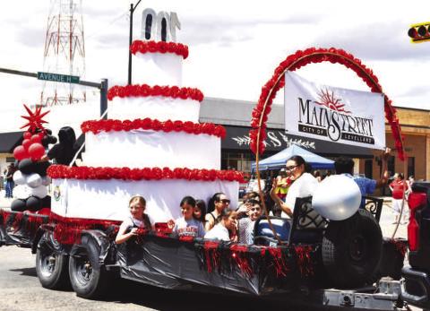 The City of Levelland Main Street parade float was all about birthday cake. Several business and entities decorated floats to celebrate Levelland’s 100th birthday. (Staff photo)