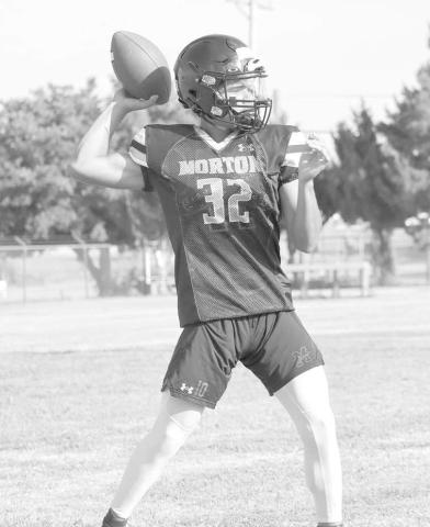 PRACTICE - Morton quarterback Dante Chavez threw to his teammates during team drills to show off his arm strength. (Staff photo by Aalijah Soliz)