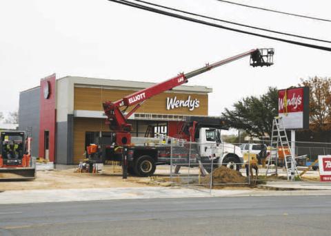 TAKING SHAPE - Progress continues for the construction of the Wendy’s restaurant which is located along College Avenue next to Prosperity Bank. Pictured is the updated exterior and signage of the restuarant that has been placed over the past week. The anticipated opening date for the location is mid-to-late January according to a recent social media post. (Staff photo by Evin Thomas)