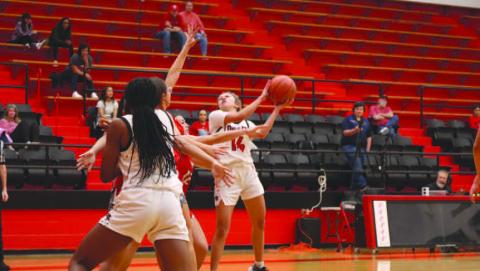PHYSICAL SHOT - Levelland Loboette Kaylee Penner made the shot against the Denver City Fillies last Monday. (Staff photo by Aalijah Soliz)