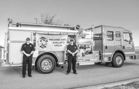 The Levelland Fire Department participated in welcoming the LISD students back to school on Thursday. Pictured is Jeff Pharis and Cooper Madewell greeting and taking photos with the students in the LABC school parking lot. (Photo courtesy of Emily Campos)