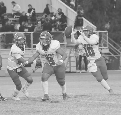 TOSS - Sundown Roughneck Rayden Flores caught the ball for the sweep run to the left this past Friday agains the Plains Cowboys on the road. (Photo courtesy of Sundown ISD)