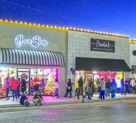 MAIN STREET – Ladies Night Out attendees shopped, ate and socialized at the Main Street event held Thursday night in downtown Levelland. Stores were decorated inside and out for the seasonal event. (Staff photo by Evin Thomas)