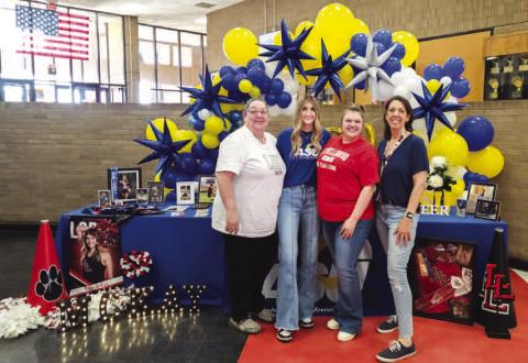 ANGELO STATE CHEER - LHS Senior Cailey McKay signed her letter of intent to cheer for Angelo State University. The signing ceremony was held Thursday in the high school commons. Pictured with McKay are Coaches DeMerritt, Northcutt and Villanueva. (Photo courtesy of Cristal Isaacks)