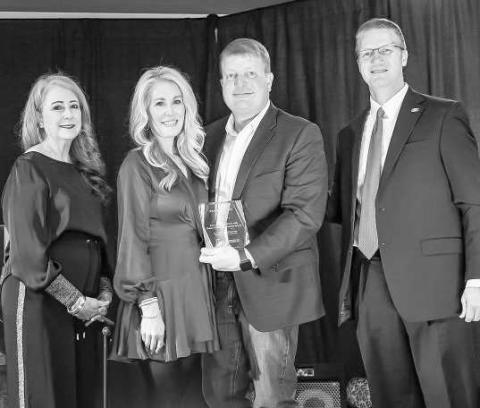 SOUTH PLAINS COLLAGE FOUNDATION - Board President Ann Capps and SPC President Dr. Robin Satterwhite present the 2024 Pacesetter Award to Scott and Jaime Bryant at the College’s 26th Annual Scholarship Gala on Feb. 23 at the Mallet Event Center in Levelland. Pictured from left are Ann Capps, Jaime Bryant, Scott Bryant and Robin Satterwhite. (Photo courtesy of SPC)