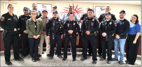 LPD Chief Erica O’Bryon announced the promotion of Sgt. Chapi Baeza at the recent city council meeting. She was joined by family and law enforcement as her father, Ismael Baeza, pinned the new badge on the officer who has been with LPD since 2019 and is currently the narcotics K-9 handler. (Staff photo)