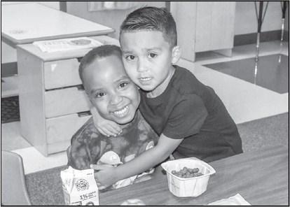 Levelland ISD Started the new school year on Thursday. Pictured is Kaydence Childers getting a big hug from his friend Benjamin Maraville who just found out they were going to be in the same Pre-K class together. ( Photo courtesy of Emily Campos)