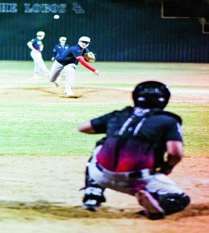 ARTEAGA ON THE MOUND - Levelland Lobo Abram Arteaga throws a pitch to the catcher from the mound in between innings during their scrimmage against Seminole this past Friday at Levelland High School. (Staff photo by Jentezen Smith)