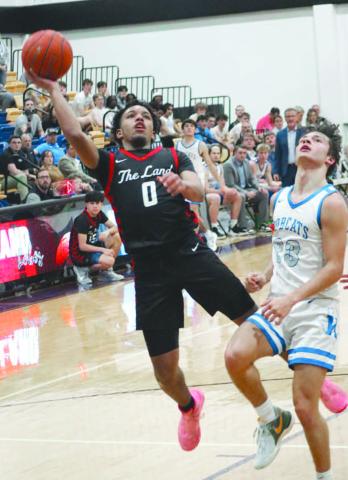 TOUGH SHOT - Levelland Lobo Jayden Castillo layed the ball up during the teams game against the Krum Bobcats this past Friday in Abilene. Jayden earned himself District 5-4AAll District Offensive MVP for his play this season. (Staff photo by Aalijah Soliz)