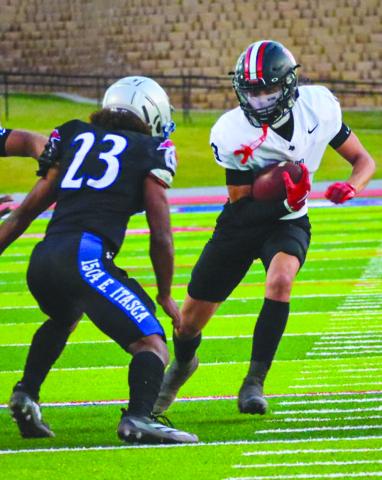 ELUSIVE - Levelland Lobo Kysen Niblett ran behind his blocker on the screen pass October 10th against the Estacado Matadors on the road. (Staff photo by Aalijah Soliz)