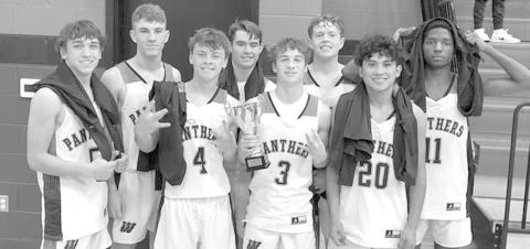CONSOLATION- The Whitharral Panthers high school boys’ basketball team went 3-1 against tough competition in the Double T Smiles Bracket of the Caprock Invitational Basketball Tournament in Lubbock over the New Years’ weekend. downed the Quanah Indians 49-46 in the consolation round. The Panthers are at home against Anton on Friday at 8 p.m. (Photo Courtesy of Janie Fryar)