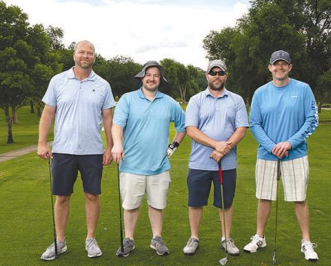 FLIGHT TWO CHAMPIONS- The United Supermarkets team claimed first place in Flight Two of the 2023 South Plains College Scholarship Scramble held Monday, June 5 at the Lubbock Country Club. Shown from left to right are: Kris Phillips, SPC Regent Ty Gregory, Terry Bryant and Lance Edwards. (Photo by R&amp;P Photographers)