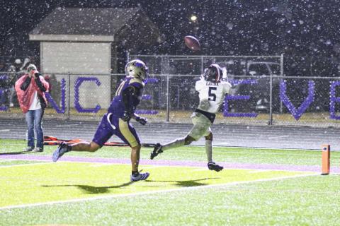 IT’S RAINING TD’S – Junior wide receiver Tobias Gavina catches a touchdown pass in the rain from Bryson Golighty during a football game against Dalhart this past Friday night at Memorial Stadium. (Staff photo by Jentezen Smith)