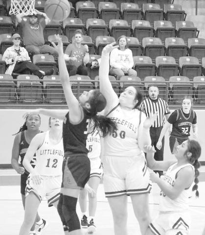 TOURNAMENT PLAY- Levelland Loboette Carly Tienda scored a lay-up in a 40-32 win over Littlefield. The Loboettes continued tournament play Thursday, December 29th in Littlefield against the Clarendon Lady Broncos. (Photo Courtesy of Derek Lopez)