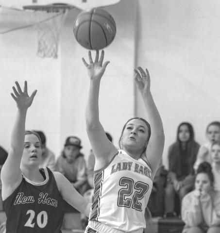 CLOSE SHOT - Ropes Lady Eagle Rylee McDaniel shot the ball during the teams first district game against New Home last Friday. (Photo courtesy of Donovan Martin)