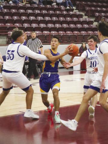 EURO STEP - Whiteface Antelope Jeremiah Rendon weaved through traffic during the team’s game against Farwell in the Littlefield Tournament. (Staff photo by Aalijah Soliz)