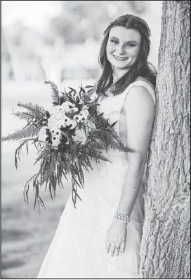 Mr. & Mrs. Christian Lujan exchange wedding vows ..nee Elizabeth Greenhaw..