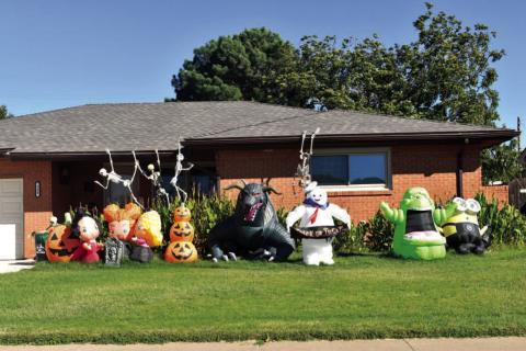 HALLOWEEN FUN- What a wonderful way to welcome Trick -or-treaters to your home. Young and old love to see the decorations of homes bringing in the good feeling of fall and Halloween. This home on Hickory St. captured the Halloween season with great decorations.(Staff photo by Emily Campos)