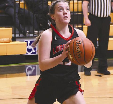 SHOT ATTEMPT- The sixth ranked Levelland Loboettes continued their district dominance with a road win in Snyder, 67-46, against the Lady Tigers Friday. Loboette Maddie Stafford attempted a lay-up during the game. (Staff Photo by Dom Puente)