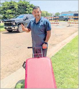 YETI COOLER WINNER - Sammy Diaz with Kennedi's Kicks became a Founding Legacy 'Company Man' member of the Sundown Library &amp; Parks Friends Group at the Oil Patch Days and his name was drawn out of the ticket hopper. (Photo courtesy of the Sundown Library)
