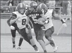 IN PURSUIT- Morton’s Alex Lopez was pursued by Plains defenders in a 22-2 Morton home loss to open UIL Class 2A-2 Region 1, District 4 high school football action. The Indians will be in Ropes on Friday night to face the Eagles at 7 p.m. (Photo Courtesy of Jay Kelley)