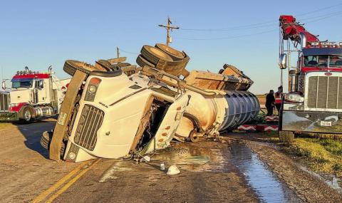 COUNTY ROLLOVER - According to Levelland-Hockley County Emergency Management, a semi traveling near the intersection of FM 1294 and FM 2130 was involved in a single-vehicle wreck. The roadway was blocked by public safety personnel from 5:30 p.m. and re-opened at 8 p.m. (Staff photo by Dom Puente)