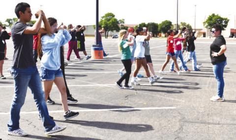 MORNING MARCHING – Pictured are students practicing marching fundamentals during the SPC band camp. The five-day camps included middle school band, high school leadership and high school drum major camps. (Staff photo by Ada Niederhauser)