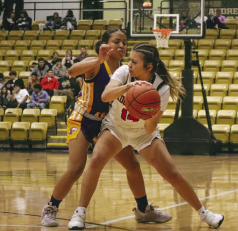 BALL SECURITY - Levelland Loboette Kaylee Penner kept the ball away from her defender during the team’s game against the Pecos Lady Eagles at the Andrews Tournament. (Staff photo by Aalijah Soliz)