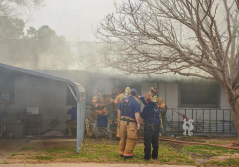 STRUCTURE FIRE - The Levelland Fire Department (LFD), Levelland Police Department (LPD) and Levelland Emergency Management Services (LEMS) resonded to a report of a fully involved structure fire located in the 1800 block of Lee Street, Friday afternoon. (Staff photo by Dom Puente)