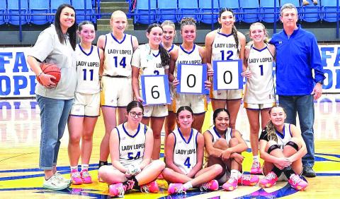 600 CAREER WINS MILESTONE - Whiteface Girl’s Head Basketball Coach Jason Blankenship earned his 600th career win by beating Stanton 68-25 at home this past Monday. The win moves the Lady Lopes to 7-2 overall this season. They’ll be back in action on Dec. 2. at 5 p.m. on the road against New Deal. (Staff photo by Jentezen Smith)
